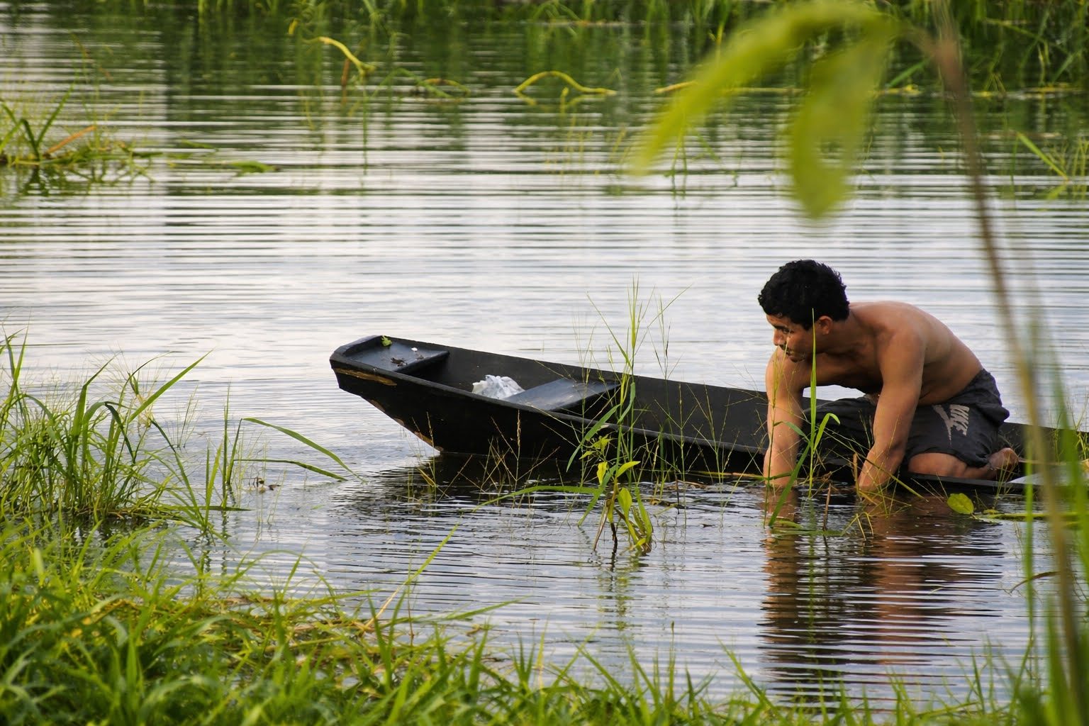Riverside resident with his canoe